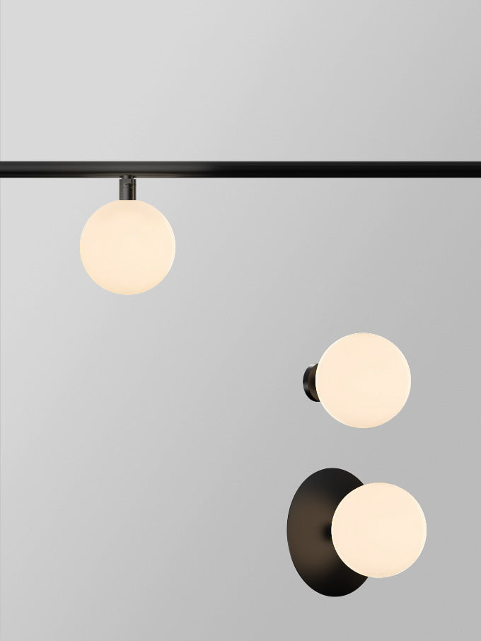 Typography Vela Globe 110 Rail Luminaire | Photo: Rakumba