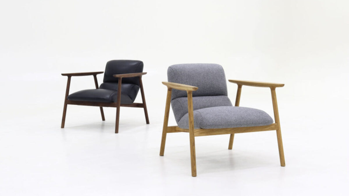 NUNC Dika lounge chair, walnut with black leather and oak with grey fabric
