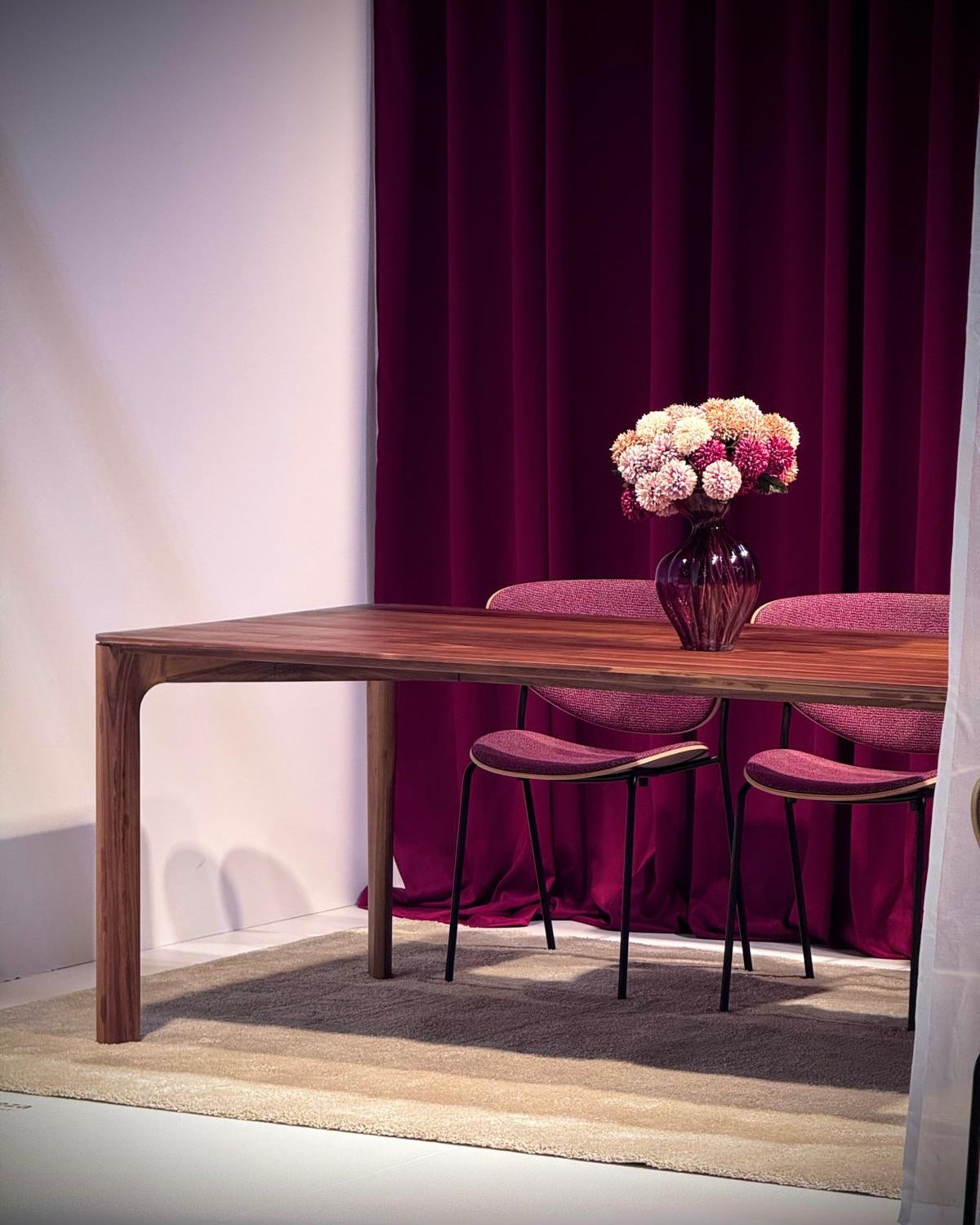 NUNC Meza dining table in walnut at Orgatec 2026
