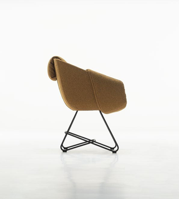 NUNC Ruvo chair, side view in ochre fabric
